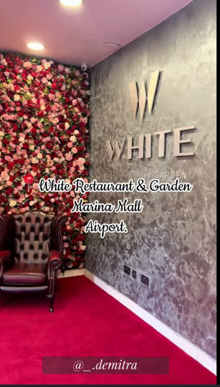 white restaurant and gardens